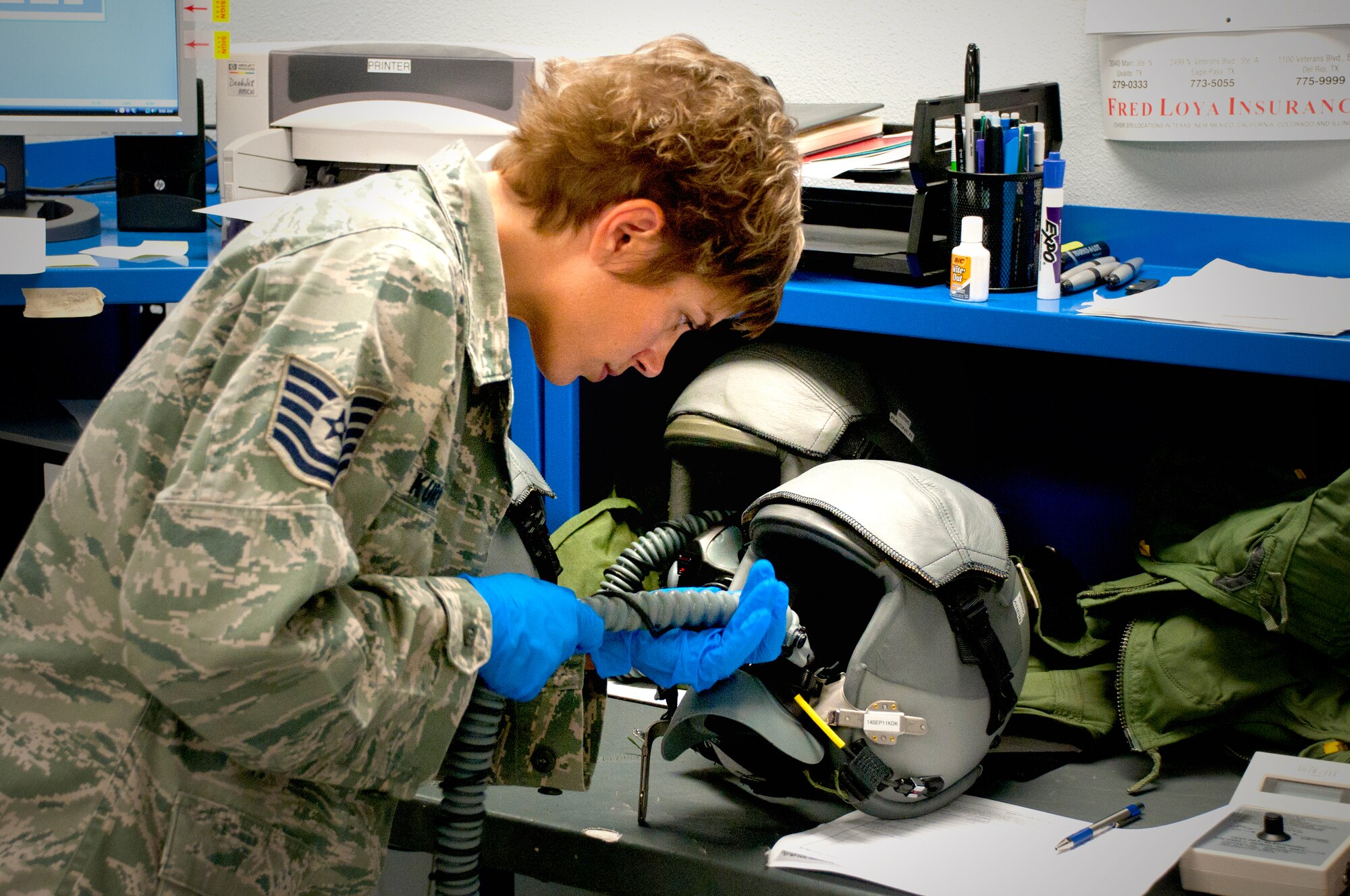 LAUGHLIN AIR FORCE BASE, Texas – Tech. Sgt. Denise Kurpier, 47th Operations Support Squadron Aircrew Flight Equipment quality assurance inspector, conducts quality insurance checks on initial build up helmets here Aug. 16. Kurpier was recently named the by the Air Force as the Aircrew Flight Equipment NCO of the Year. (U.S. Air Force photo by Senior Airman Scott Saldukas)