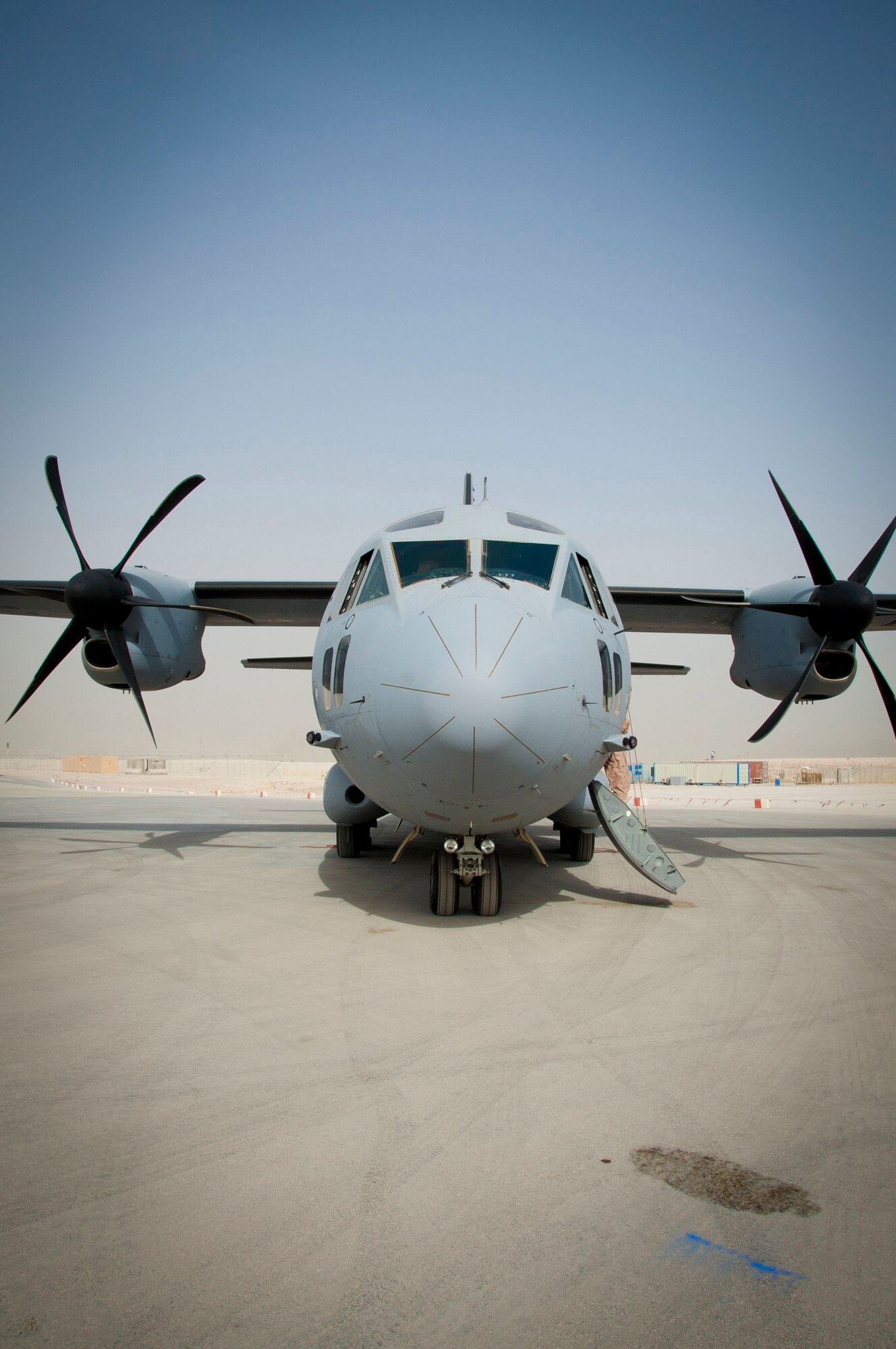 A C-27 sits at Kandahar Air Field, Afghanistan, during a training mission Aug. 3, 2011. Both Army and Air Force members fly and maintain the C-27s. (U.S. Air Force photo by Senior Airman Corey Hook)