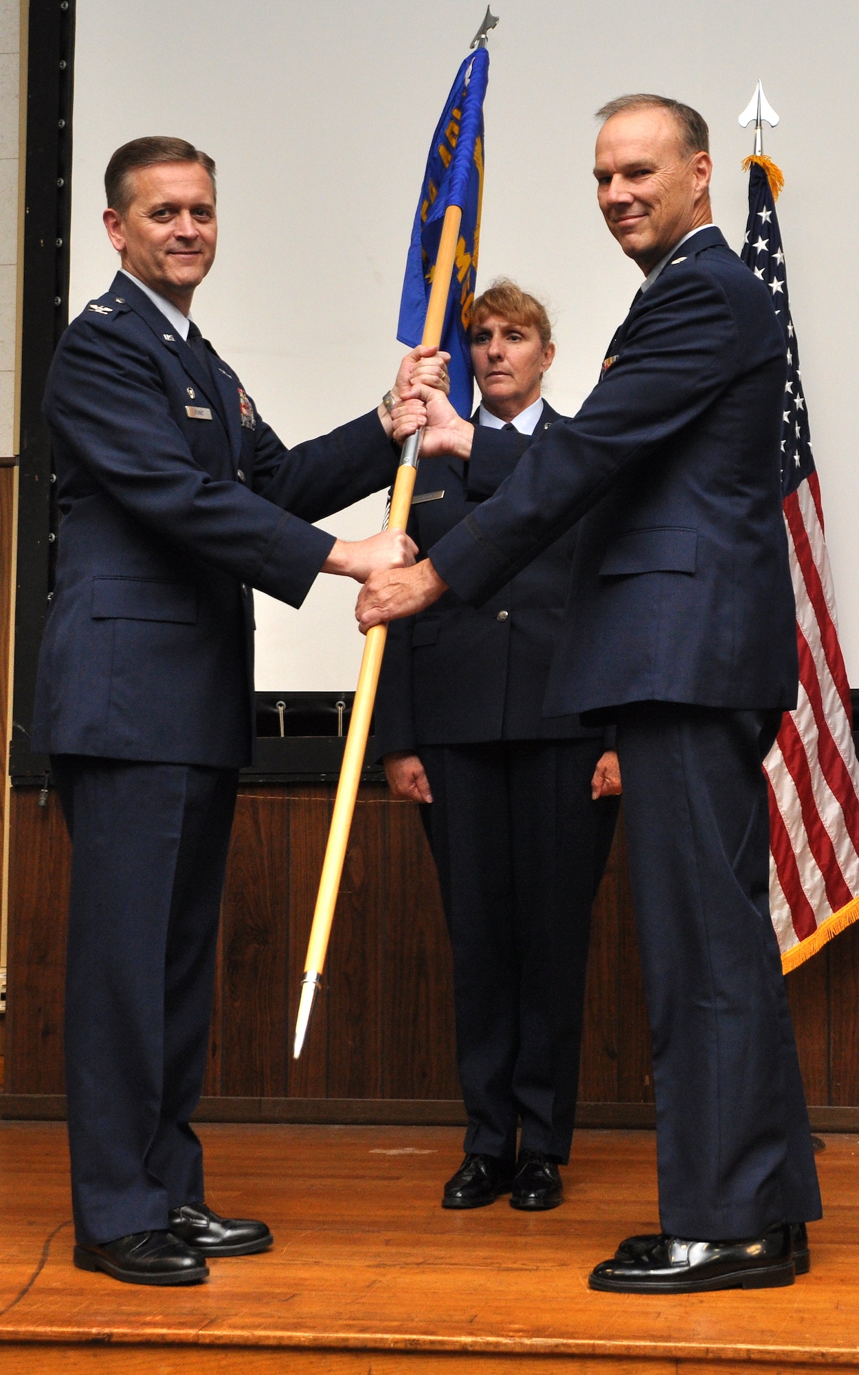 JOINT BASE ANDREWS, Md. -- Col. Russell A. Muncy (left), 459th Air Refueling Wing commander, passes the 459th Mission Support Group guidon to Lt. Col. Dale Bateman in a change of command ceremony here Aug. 13, 2011. Colonel Bateman assumes command of the 459th MSG from Col. James A. Gray who will be taking an Individual Mobilization Augmentee position at the Pentagon with the Air Force Reserve. (U.S. Air Force photo/Tech. Sgt. Steve Lewis)