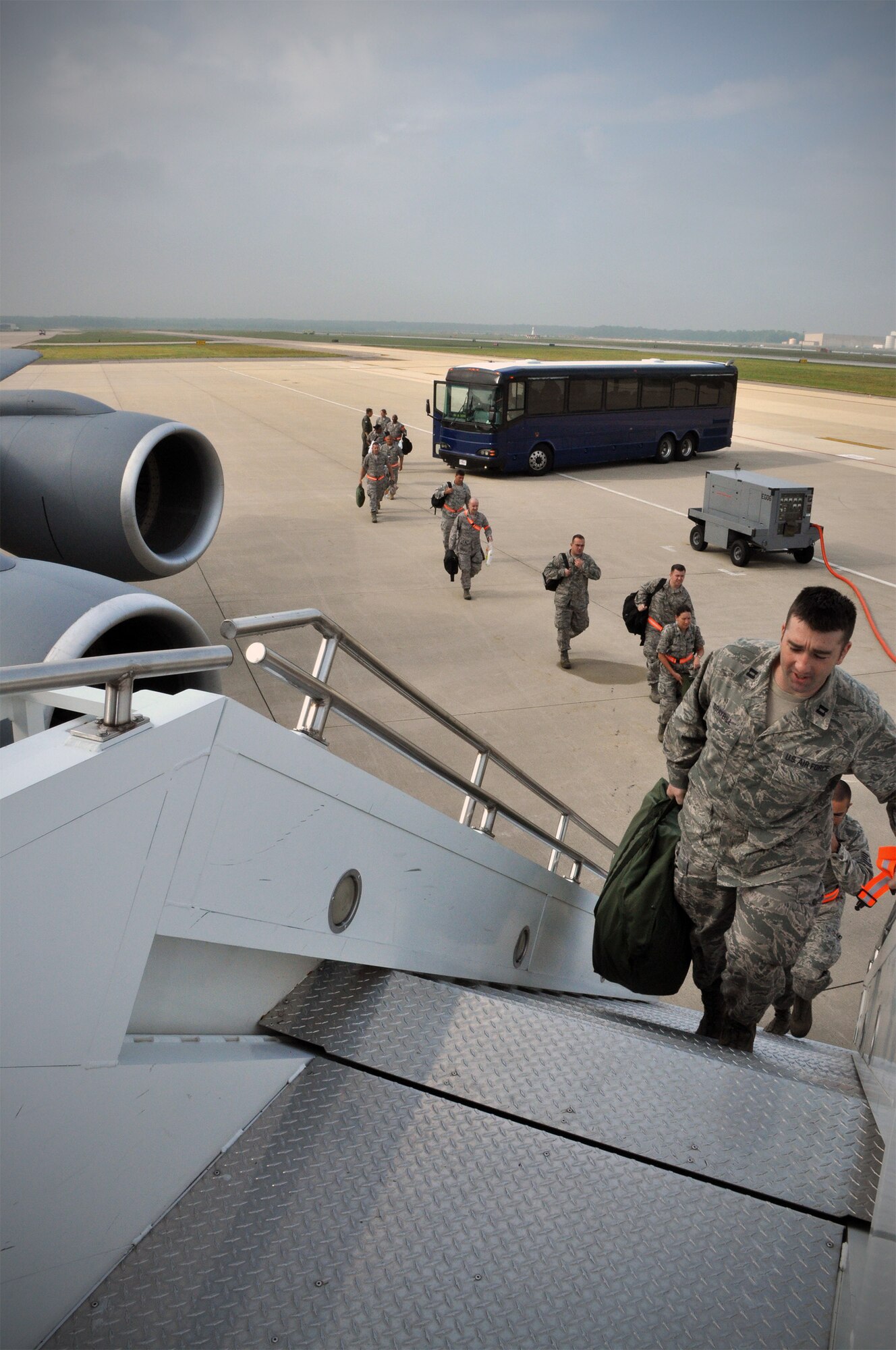 JOINT BASE ANDREWS, Md. -- Airmen from the 459th Air Refueling Wing board a KC-135 Stratotanker heading to Volk Field, Wis., for an Operational Readiness Training Program here Aug. 15, 2011. During the ORTP, the 459 ARW learned additional skills and practiced techniques that prepared the Reserve Airmen for both real-world rapid deployment scenarios and an upcoming Operational Readiness Inspection in 2012. (U.S. Air Force Photo/Tech. Sgt. Steve Lewis) 