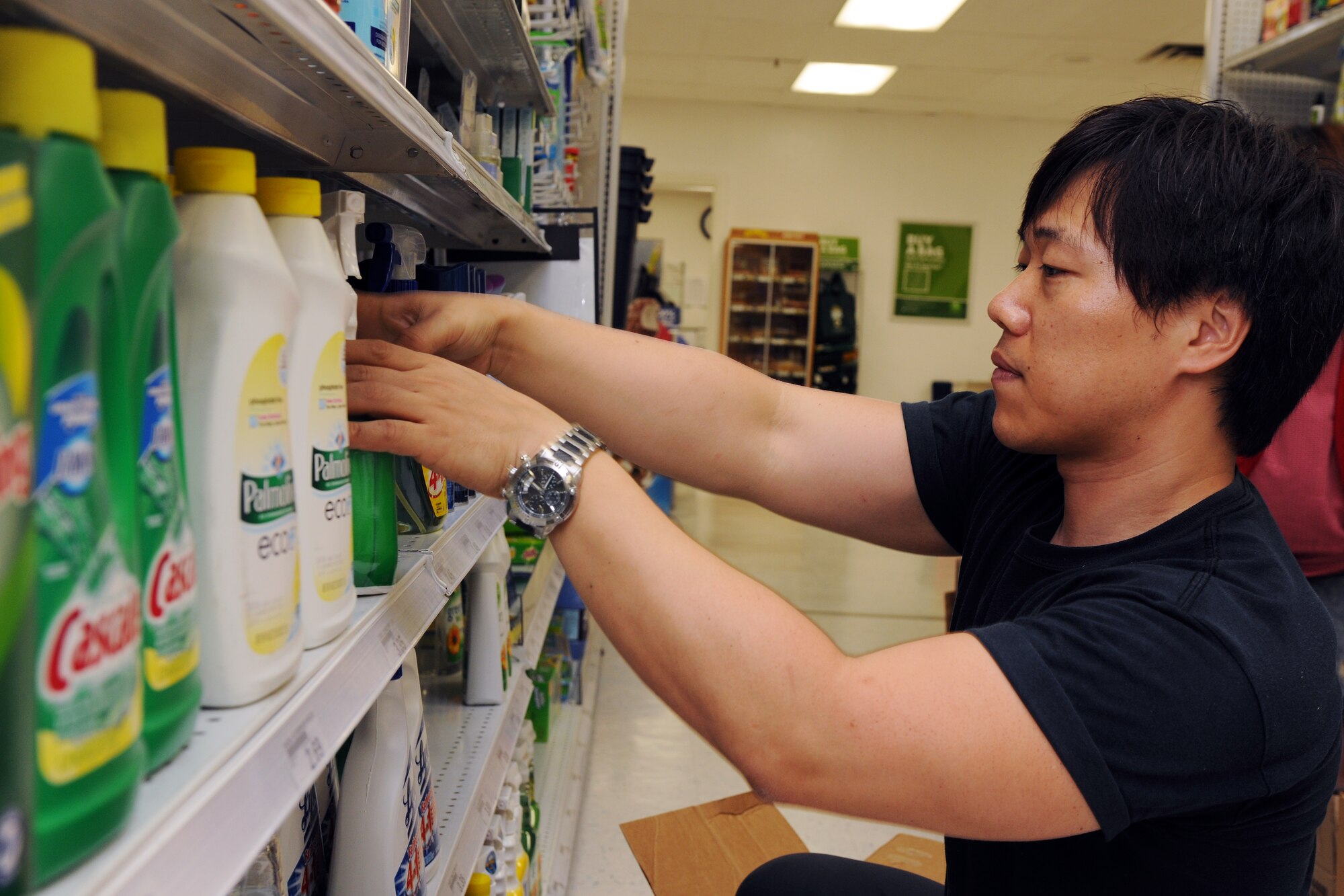 KUNSAN AIR BASE, Republic of Korea – An employee of the Army, Air Force Exchange Services employee stocks shelves at the Base Exchange here Aug. 16. AAFES facilities in Korea are receiving large shipments of merchandise after a software program issue in May. (U.S. Air Force photo/Senior Brittany Y. Bateman)
