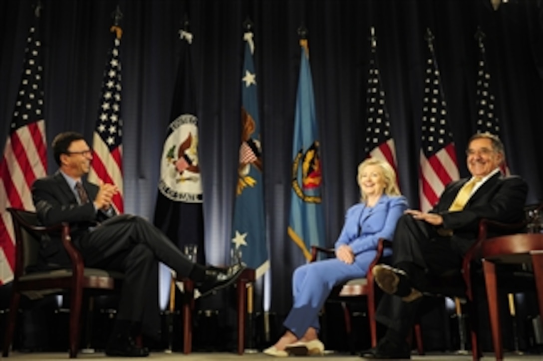 Secretary of Defense Leon E. Panetta and Secretary of State Hillary Rodham Clinton meet for a televised conversation at the National Defense University in Washington, D.C., on Aug. 16, 2011.  Frank Sesno, director of the School of Media and Public Affairs at George Washington University, moderated the event during which Panetta and Clinton discussed a wide range of defense-related issues.  