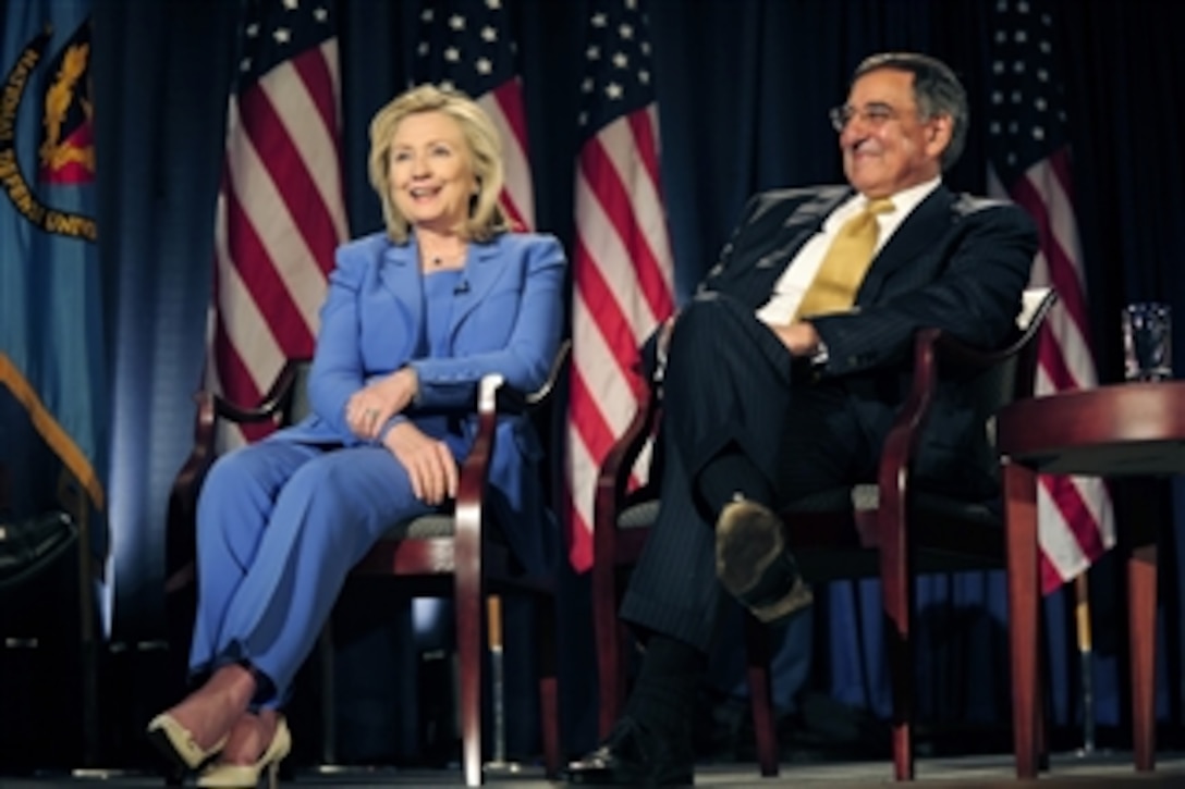 Secretary of Defense Leon E. Panetta and Secretary of State Hillary Rodham Clinton meet for a televised conversation at the National Defense University in Washington, D.C., on Aug. 16, 2011.  Frank Sesno, director of the School of Media and Public Affairs at George Washington University, moderated the event during which Panetta and Clinton discussed a wide range of defense-related issues.  