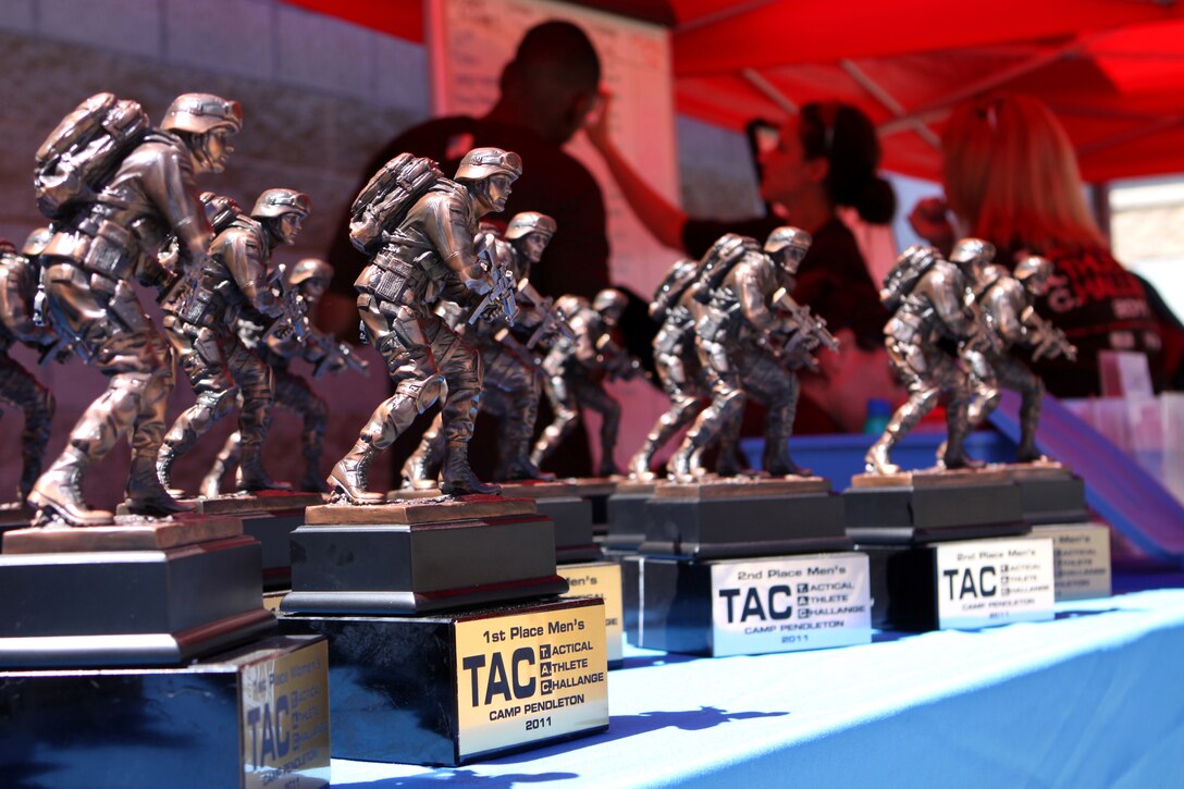 Trophies were awarded to each member of the men’s and women’s squads with the fastest combined times at the Marine Corps Community Service and Semper Fit’s Tactical Athlete Challenge at Camp Pendleton’s 11 Area football field, Aug. 17.