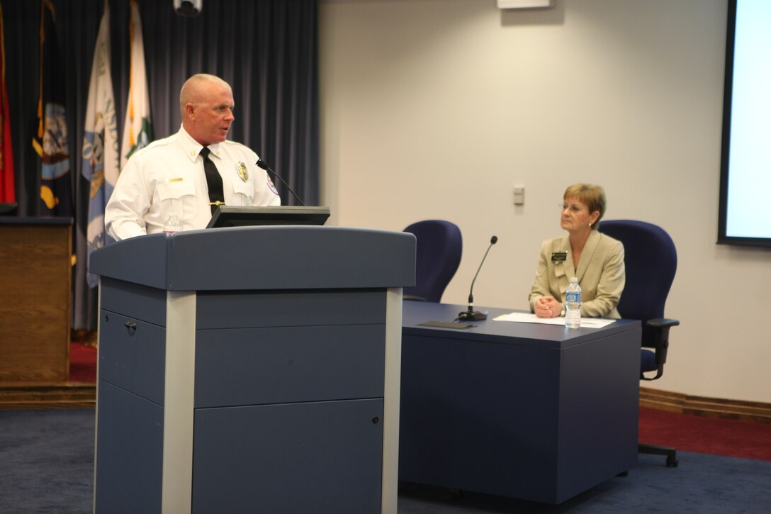 Master Gunnery Sgt. Pete Trilio, who serves as the fire chief for the Piney Green Volunteer Fire Department, accepts the Fire Fighter Professional of the Year award during the 2011 Onslow County Public Safety Awards at the Jacksonville City Hall, Aug. 17. Trilio was one of the first on the scene after the April 16 tornado.