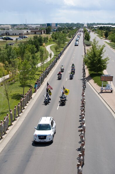 BUCKLEY AIR FORCE BASE, Colo. -- The funeral procession of Colorado Army National Guard Chief Warrant Officer 4 David R. Carter leaves Buckley, Aug. 17, 2011.  Carter is one of thirty service members killed on Aug. 6, 2011 in Wardak province, Afghanistan during a rescue mission of Operation Enduring Freedom. (U.S. Air Force photo by Airman 1st Class Phillip Houk)