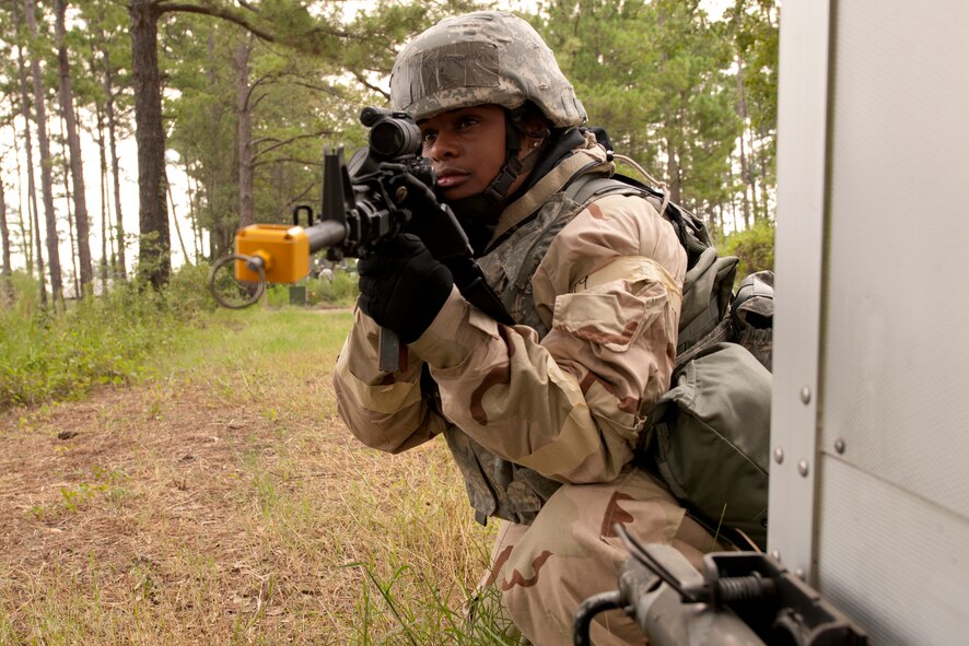 U.S. Air Force Senior Airman Alexandria Brye, 23rd Security Forces Squadron team member, monitors the perimeter for possible intruders at the entry control point to Base X during a phase II operational readiness exercise (ORE) at Moody Air Force Base, Ga., Aug. 16, 2011. The ORE challenges Brye and fellow Team Moody members on their capability to handle possible real-world situations in a wartime environment. (U.S. Air Force Photo by Staff Sgt. Joshua J. Garcia/Released)