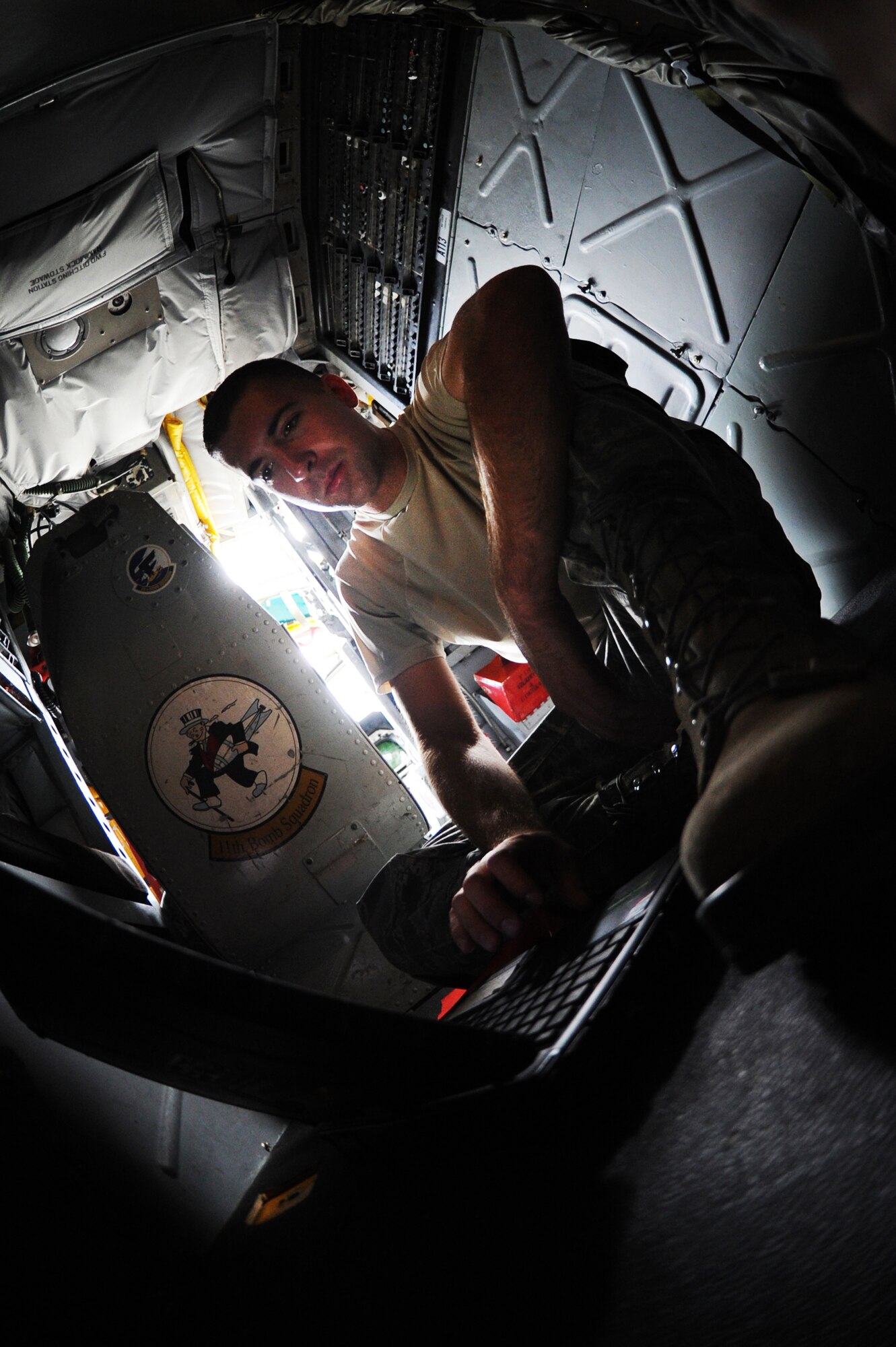 MINOT AIR FORCE BASE, N.D. -- Senior Airman Kent Bode, 5th Aircraft Maintenance Squadron assistant crew chief, checks the co-pilot's spare bulb bracks for the second annual Air Force Global Strike Command Global Strike Challenge here, Aug. 16. Minot Airmen from both the 5th Bomb Wing and the 91st Missile Wing participate in this year's AFGSC Global Strike Challenge during the months of June through November to showcase the world's premier bomber and ICBM force and to recognize outstanding AFGSC personnel and teams. (U.S Air Force photo by Senior Airman Aaron-Forrest Wainwright) (RELEASED)