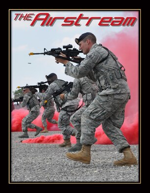 Senior Airman Patrick B. Payne, 910th Security Forces Squadron fireteam member, participates in a demonstration of mission capabilities July 10  during the 2011 Employer Awareness Day. Approximately 60 civilian employers were welcomed to YARS for a tour of the base, Security Forces training scenario, firefighting demonstration and a flight over Niagara Falls in a C-130 Hercules aircraft. The annual event is conducted with cooperation from the National Committee for Employer Support of the Guard and Reserve. U.S. Air Force photo by Staff Sgt. Valerie Smock.
