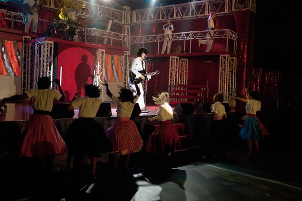 WILMINGTON, Mass. – As part of this year’s theme, Rhythm Nation, Tops in Blue pays tribute to Elvis, the king of rock ‘n’ roll, at the Aleppo Shriners Auditorium Aug. 10. Tops In Blue is the premier entertainment showcase of the U.S. Air Force. The performance also included the jazz of Nat King Cole and Billie Holiday, the rock 'n' roll sounds of Little Richard and Jerry Lee Lewis, the R&B of Marvin Gaye and Tammi Terrell, hits by Jennifer Lopez and Michael Franti, some inspirational country sounds and more. Their tour schedule spans more than 125 locations and also includes entertaining forward-deployed troops in various locations such as Iraq, Afghanistan and other Southwest Asia bases. (U.S. Air Force photo by Rick Berry)