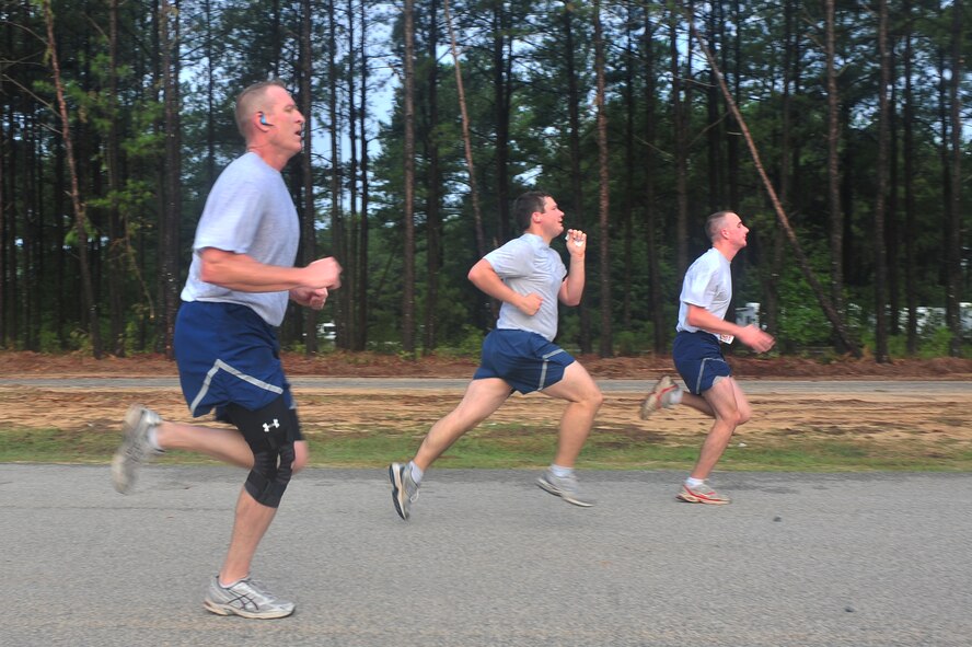 U.S. Air Force Airmen participate in the 5k Poker Run sponsored by the 20th Force Support Squadron Fitness Center at Shaw Air Force Base, S.C. Aug. 12, 2011.There were about 160 Team Shaw members who participated in this event.(U.S. Air Force photo by Airman 1st Class Ashley Gardner/Released)
