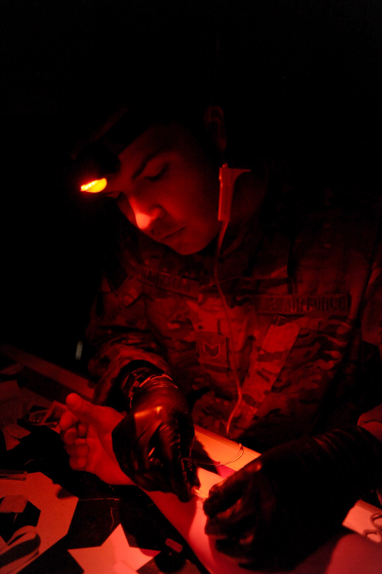 Staff Sgt. Ryan Hartman, deployed from the 81st Medical Operations Squadron, connects the intravenous tubing to his patient's arm during his weekly medical  refresher training at Shindand Air Base, Afghanistan, Aug. 6. Hartman is a joint expeditionary tasking Airman deployed to Afghanistan and is attached to the Army's 298th Combat Sustainment Support Battalion in support of Operation Enduring Freedom. The JET mission is a high-visibility program that makes up just 5 percent of all Air Force deployments and provides combat mission ready Airmen to Army combatant commanders. Second Air Force, headquartered at Keesler, trains and provides oversight of Airmen completing Army training prior to JET missions through its 602nd Training Group (Provisional).  (U.S. Air Force photo by Master Sgt. William Greer)