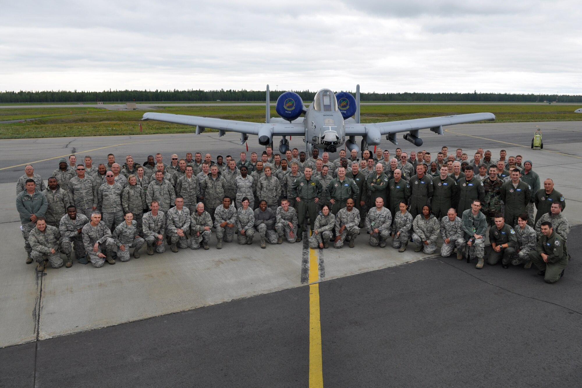 Members of the 917th Fighter Group from Barksdale Air Force Base, La., pose for a group photo at Eielson Air Force Base, Alaska, Aug. 5, 2011. Approximately 100 members of the 917th FG deployed to Alaska after converting to a combat squadron from a training unit to prepare for an upcoming Air and Space Expeditionary rotation. (U.S. Air Force Photo/Senior Master Sgt. Jessica D'Aurizio)