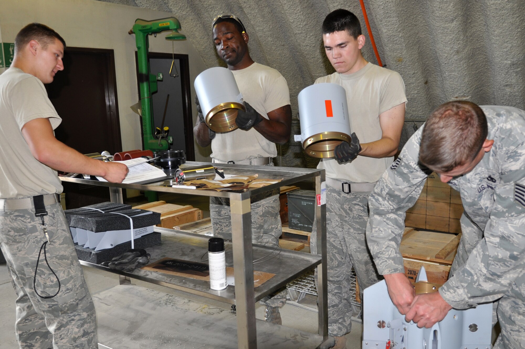 A-10 Thunderbolt II weapons builders from the 917th Fighter Group at Barksdale Air Force Base, La., build Guided Bomb Unit 12s for live drops while deployed for training to Eielson Air Force Base, Alaska, Aug. 4, 2011. Approximately 100 members of the 917th FG deployed to Alaska after converting to a combat squadron from a training unit to prepare for an upcoming Air and Space Expeditionary rotation. (U.S. Air Force Photo/Senior Master Sgt. Jessica D'Aurizio)