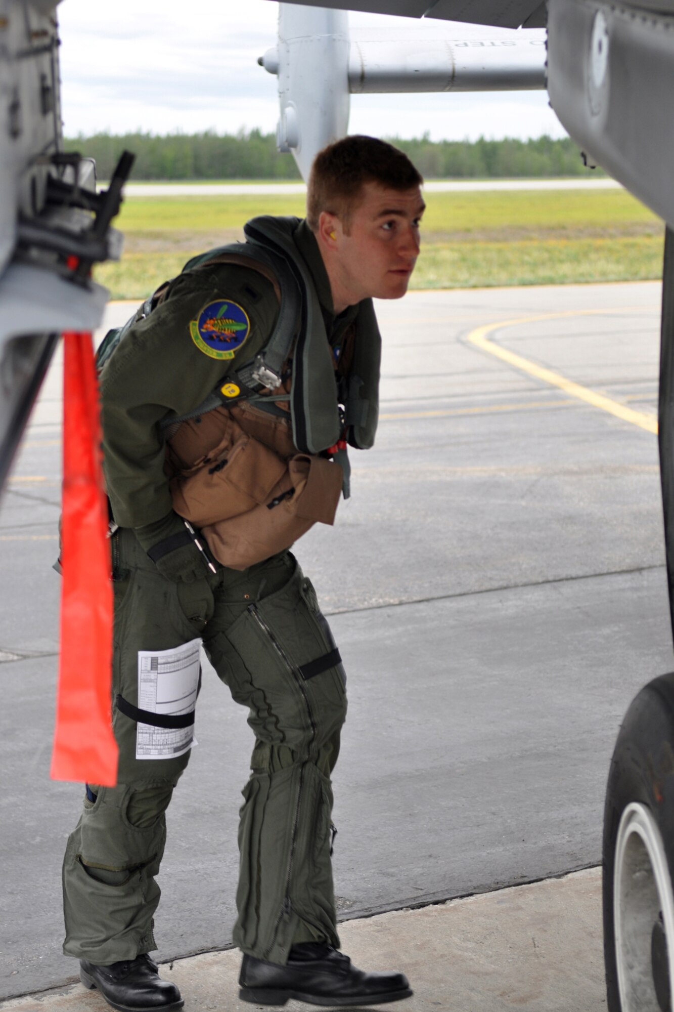 1st Lt. Dave Knighton, an A-10 Thunderbolt II pilot assigned to the 917th Fighter Group at Barksdale Air Force Base, La., checks his aircraft prior to flight while deployed to Eielson AFB, Alaska. Approximately 100 members of the 917th FG deployed to Alaska to prepare for an upcoming Air and Space Expeditionary rotation. (U.S. Air Force photo/Senior Master Sgt. Jessica D'Aurizio)