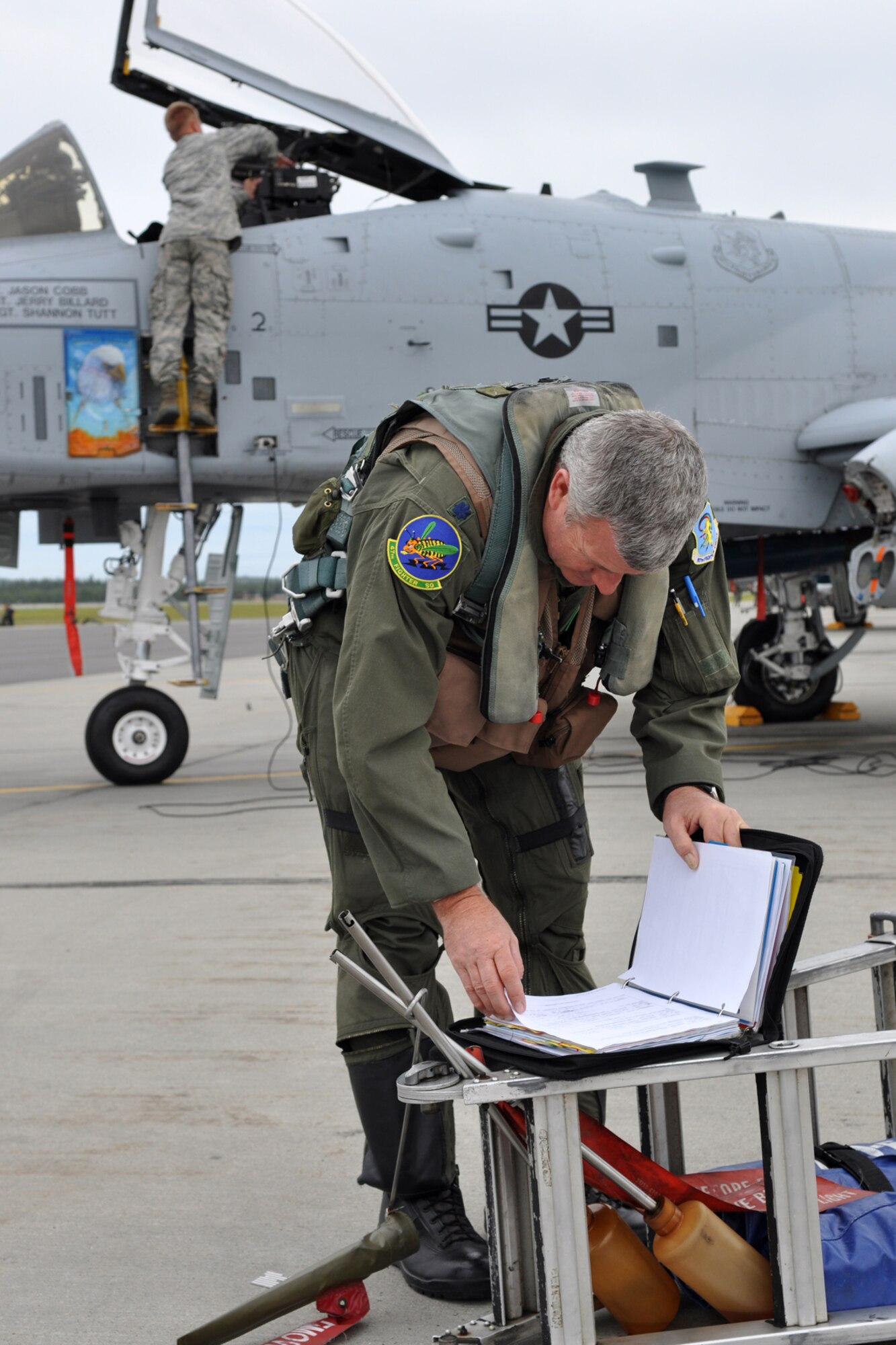 Lt. Col. Mark Olson, an A-10 Thunderbolt II pilot assigned to the 917th Fighter Group from Barksdale Air Force Base, La., prepares for a flight while deployed to Eielson Air Force Base, Alaska. Approximately 100 members of the 917th FG deployed to Alaska to prepare for an upcoming Air and Space Expeditionary rotation.   (U.S. Air Force photo/Senior Master Sgt. Jessica D'Aurizio)