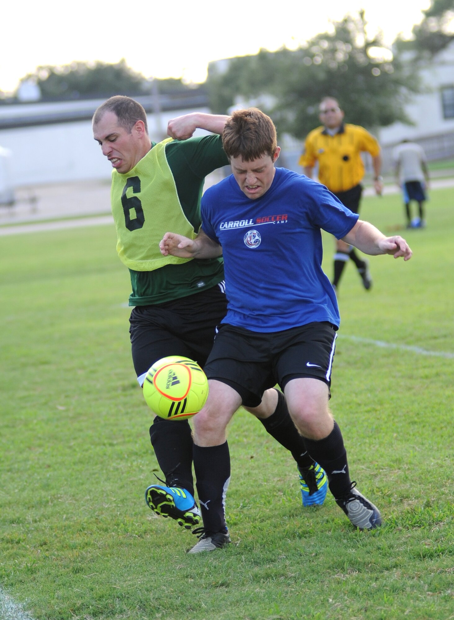 William Benedict, left, 334th Training Squadron, and Sean Coombs, 333rd TRS, battle for control of the ball in an East Division game Aug. 11. The 334th TRS claimed the win, 2-0.  (U.S. Air Force photo by Kemberly Groue)