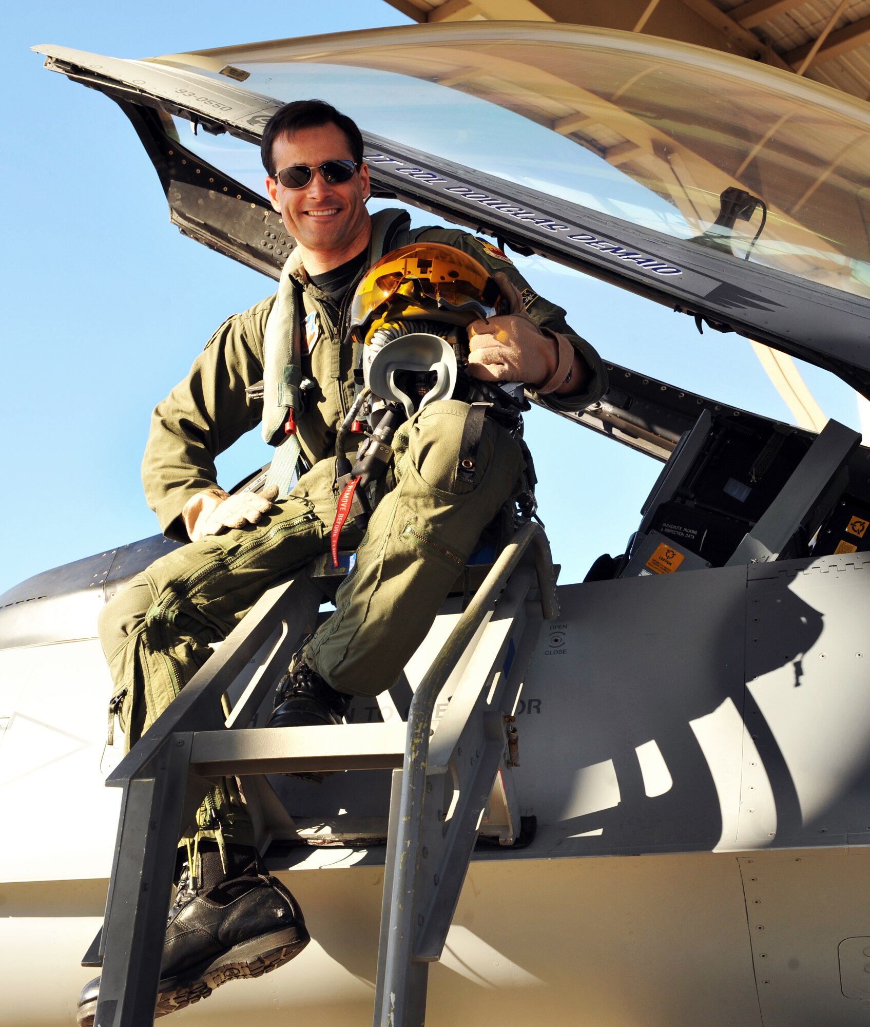 U.S. Air Force Lt. Col. Douglas DeMaio, former 55th Fighter Squadron commander, poses by an F-16 Fighting Falcon before a flight Dec. 12, 2010, Shaw Air Force Base, S.C. DeMaio was recently awarded the 2011 Lance P. Sijan USAF Leadership Award in the senior officer category for Air Combat Command. DeMaio is currently attending the Industrial College of the Armed Forces at Fort McNair, Washington D.C. (U.S. Air Force photo by Airman 1st Class Tabatha Duarte)(Released)