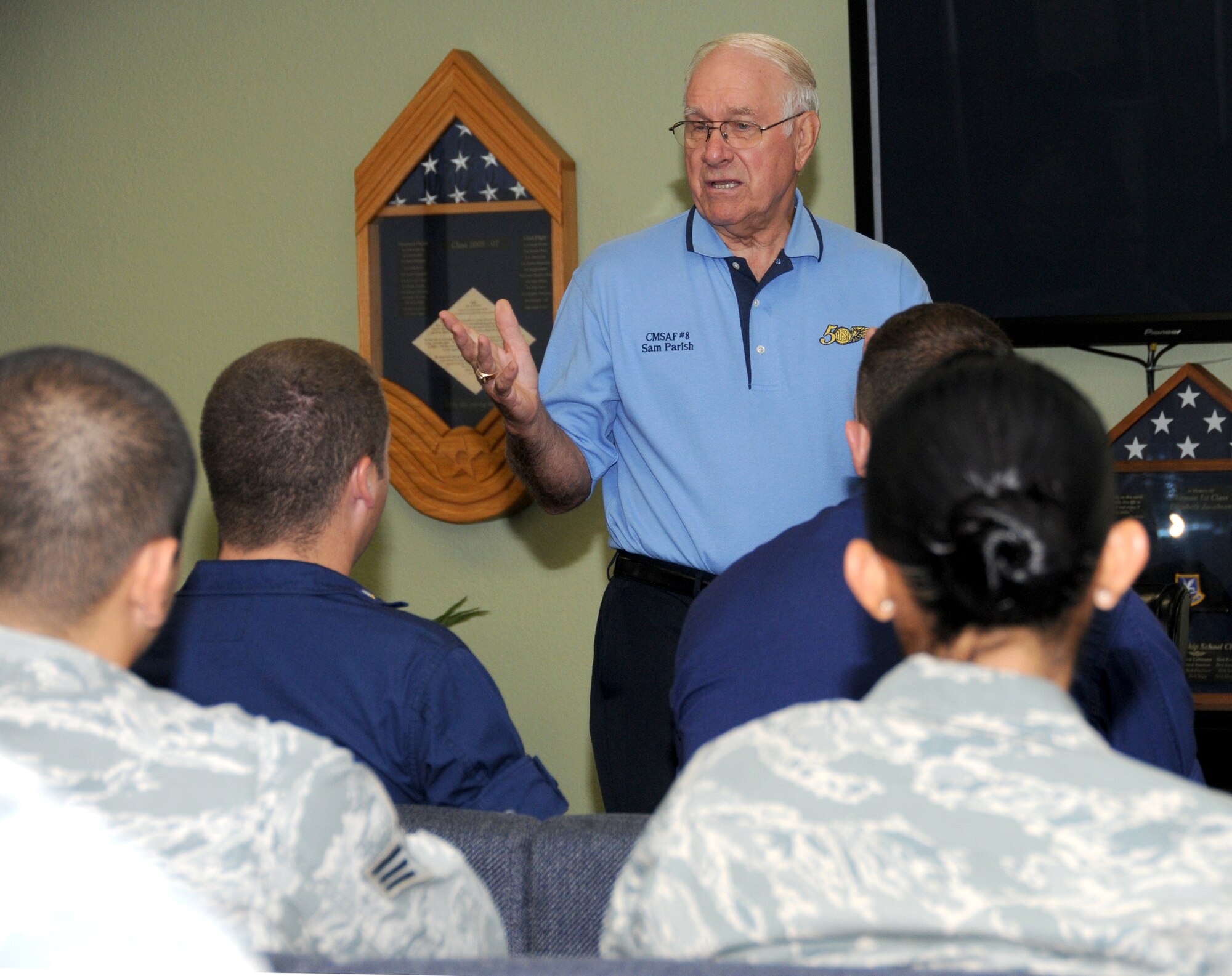 The eighth Chief Master Sergeant of the Air Force, Sam Parish, speaks to Airmen from
the Airman Leadership School and the first term airman center August 12. Parish, who
was the Air Force’s top enlisted leader from 1983-1986, was the guest speaker at Friday’s senior noncommissioned officer induction ceremony and addressed students at the Mathies NCO Academy.  (U.S. Air Force photo by Kemberly Groue)
