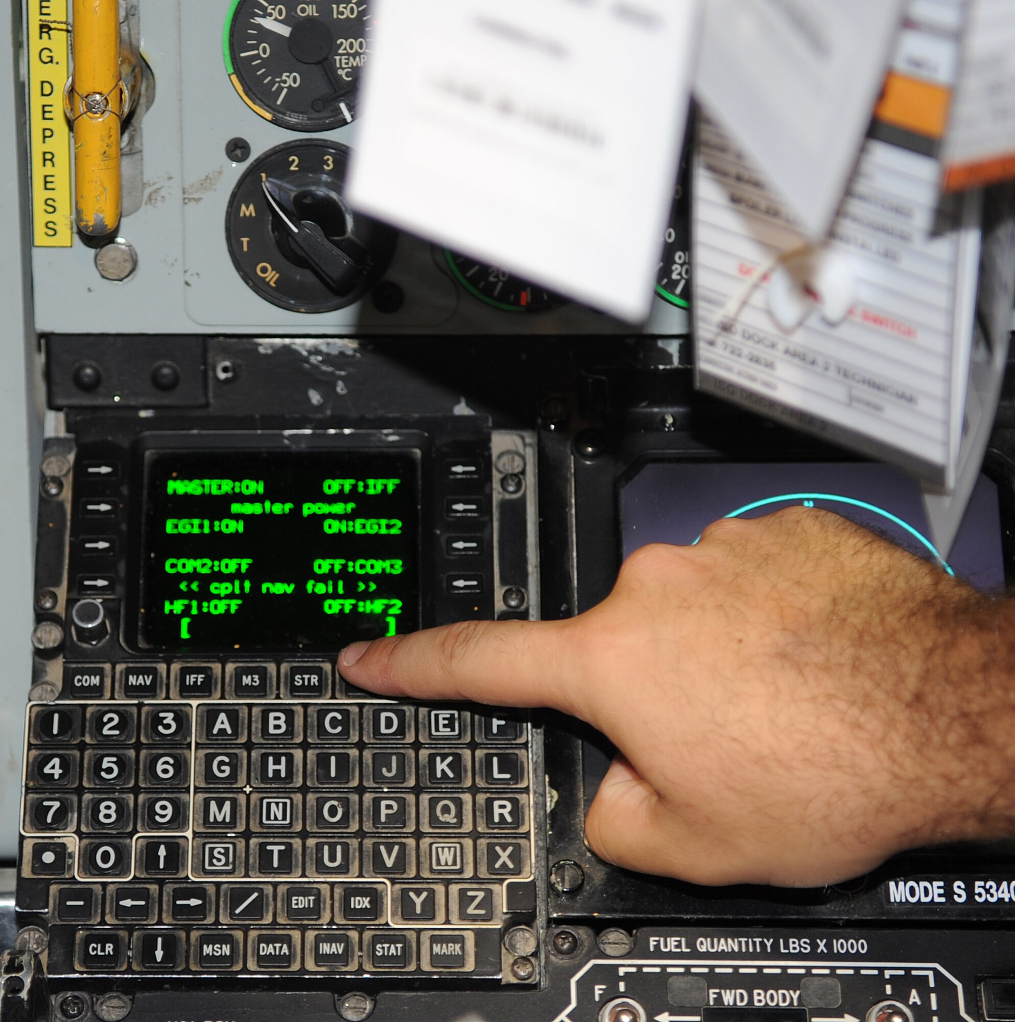 SEYMOUR JOHNSON AIR FORCE BASE, N.C. -- Staff Sgt. Dwyane Elders, 911th Air Refueling Squadron integrated avionics systems lead technician, performs a function check on KC-135R Stratotanker's electrical systems display here Aug. 16, 2011. Properly functioning displays ensures aircrew a safe and reliable flight. Elders Hails from Deerborn, Mich. (U.S. Air photo by Senior Airman Gino Reyes/Released)