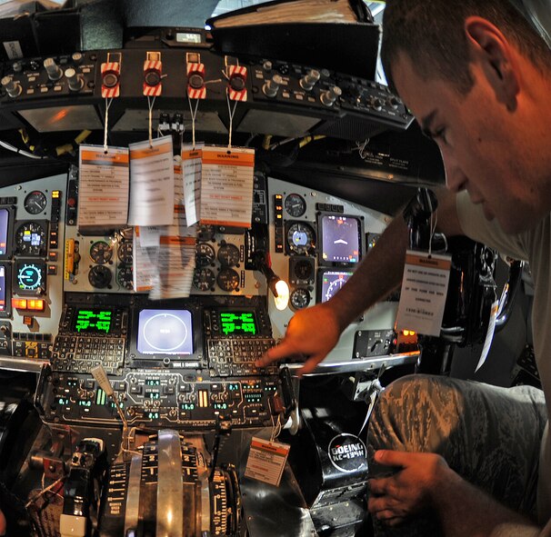 SEYMOUR JOHNSON AIR FORCE BASE, N.C. -- Staff Sgt. Dwyane Elders, 911th Air Refueling Squadron integrated avionics systems lead technician, tests multifunctional displays on a KC-135R Stratotanker here Aug. 16, 2011. Displays will inform aircrew of every action the aircraft makes in the air.  Elders hails from Deerborn, Mich. (U.S. Air Force photo by Senior Airman Gino Reyes/Released)