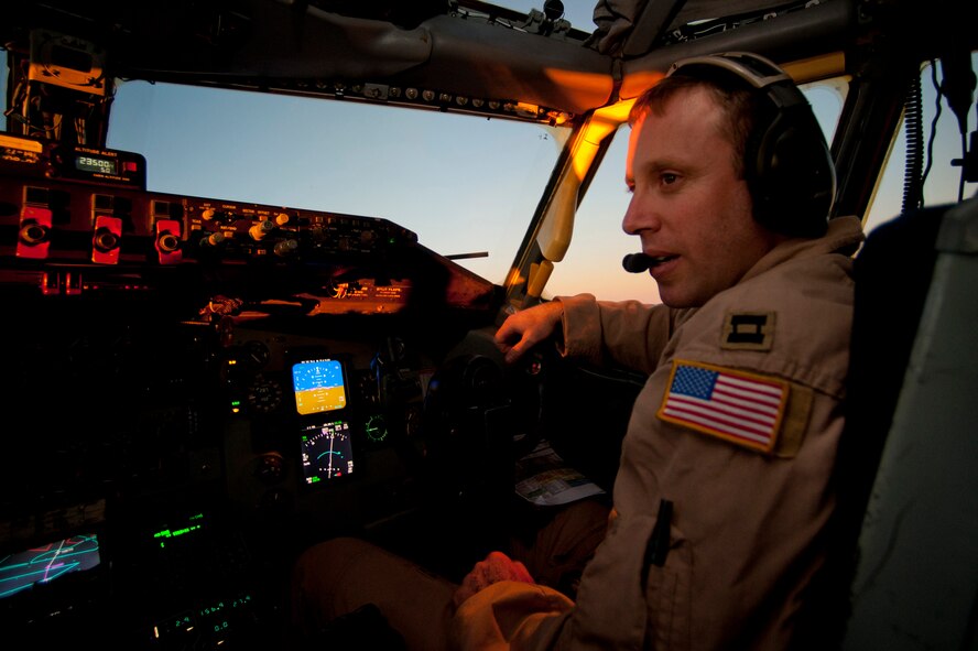 U.S. Air Force Capt. Matthew Valentino, assigned to the 340th Expeditionary Air Refueling Squadron, flies a KC-135 Stratotanker aircraft during an air refueling mission over Afghanistan Jan. 14, 2011. Valentino was with the 157th Air Refueling Wing, Pease Air National Guard Base, N.H. (U.S. Air Force photo by Master Sgt. Adrian Cadiz/Released)