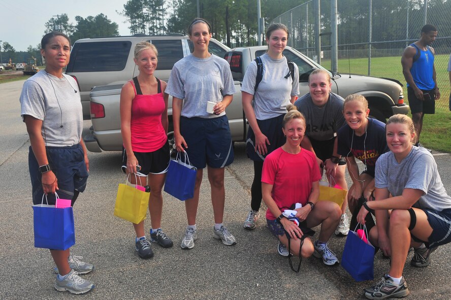 Team Shaw's 5k Poker Run female winners pose for a photo after the race at
Shaw Air Force Base, S.C. Aug. 12, 2011.There were about 160 Team Shaw members who participated in this event. (U.S. Air Force photo
by Airman 1st Class Ashley Gardner/Released)
