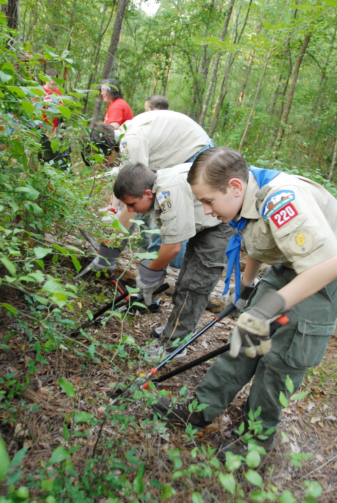 Troop 220 put in 155 hours restoring Tree Frog Trail, a half-mile nature trail located behind Luna Lake Lodge that had been rendered almost unusable by fallen trees and overgrowth. U. S. Air Force photo by Wayne Crenshaw