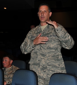Senior Master Sgt. Mark Carabetta asks a question regarding the height restrictions of an airframe, Aug. 11, 2011, at Joint Base Charleston-Air Base, during an Air Transportation Test Loading Activity conference. More than 140 loadmasters, aerial porters and representative from various agencies who use airlift to transport cargo, traveled from all over the world to learn about the process of certifying specialized loads through ATTLA. Carabetta is from the 81st Aerial Port Squadron. (U.S. Air Force photo/Airman 1st Class Jared Trimarchi)
