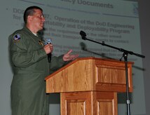 Master Sgt. Tom McPeak explains the process of transporting specialized cargo, Aug. 11, 2011, at Joint Base Charleston, S.C., during the Air Transportation Test Loading Activity Conference. More than 140 loadmasters, aerial porters and representative from various agencies who use airlift to transport cargo, traveled from all over the world to learn about the process of certifying specialized loads through ATTLA. McPeak is an ATTLA representative from Wright-Patterson Air Force Base, Ohio. (U.S. Air Force photo/Airman 1st Class Jared Trimarchi) 