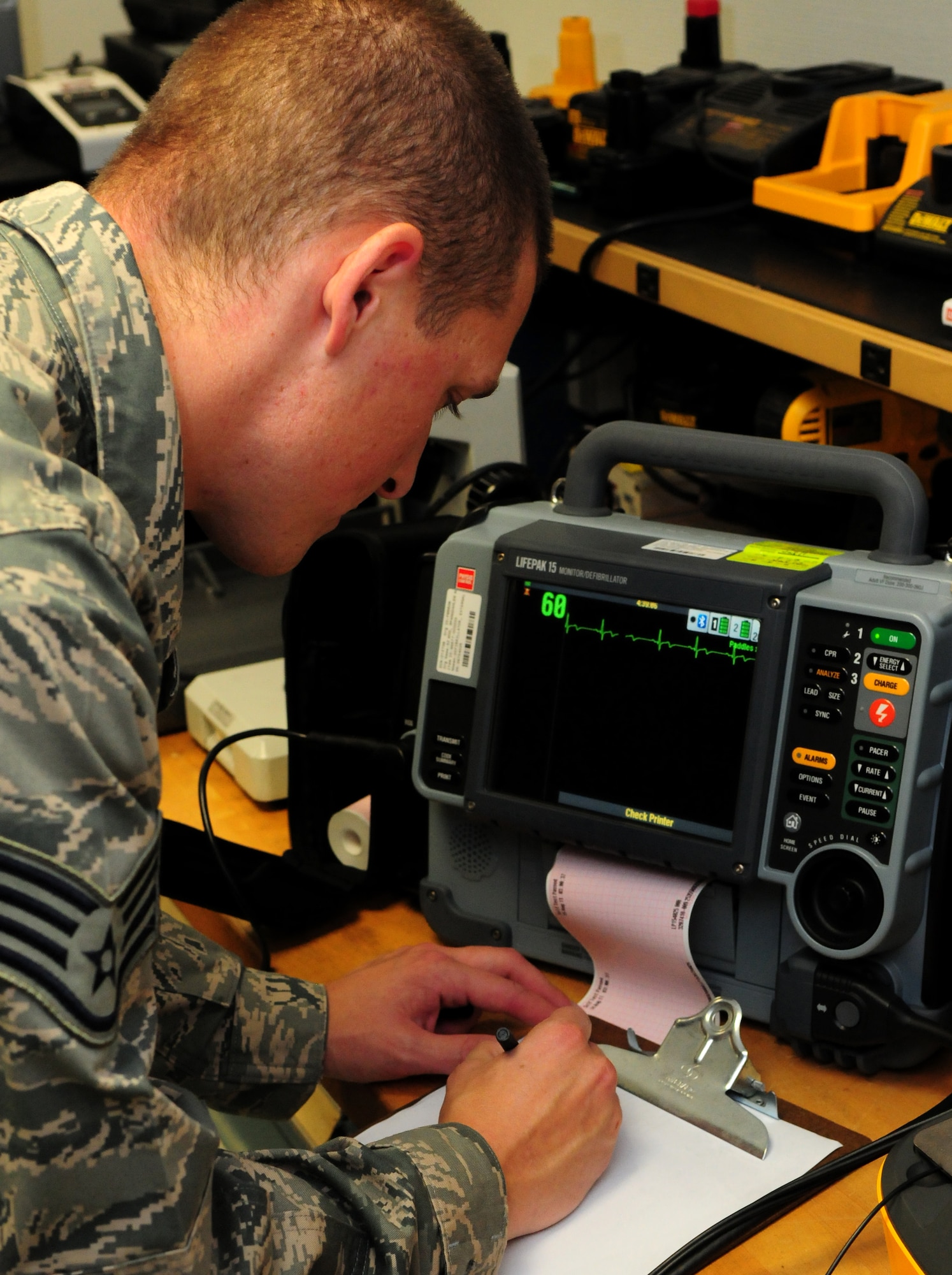 SPANGDAHLEM AIR BASE, Germany – Staff Sgt. Elijah Bonzer, 52nd Medical Support Squadron biomedical equipment technician, calibrates a defibrillator here Aug. 16. Biomedical equipment technicians, part of the 52nd MDSS Medical Logistics Flight, maintain and repair equipment used by the 52nd Medical Group, ensuring they have what they need to keep Saber Airmen and their families healthy. (U.S. Air Force photo/Airman 1st Class Matthew B. Fredericks)