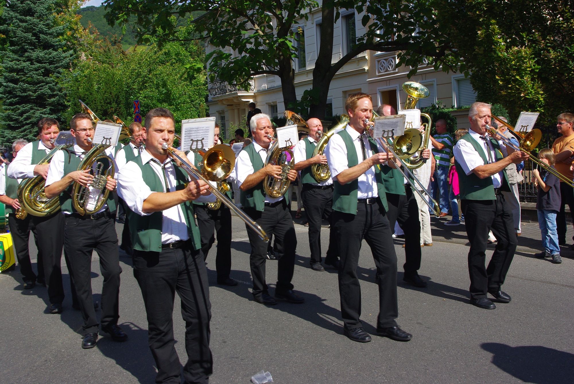 SPANGDAHLEM AIR BASE, Germany -- Among the highlights of the Bernkastel festival is a folk parade at 2 p.m. Sept. 4 this year, featuring about 100 floats and bands parading through the city.  Local music associations walk in the parade entertaining the observers who stand along the street. The Bernkastel middle Mosel festival officially starts at 3:30 p.m. Sept. 2 with the opening of the amusement ride park and market along the Mosel River shore in Kues.  Tens of thousands of visitors, to include many base members, come to the festival annually, sampling finest Mosel wines and enjoying the festivities. The festival ends around midnight Sept. 5. (U.S. Air Force photo/Iris Reiff)