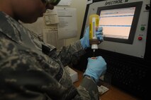 KUNSAN AIR BASE, Republic of Korea -- Staff Sgt. Victoria Ostiguy, 8th
Maintenance Squadron nondestructive inspection technician, burns engine
oil to detect any irregularities here Aug. 17.  This is one of many
techniques the nondestructive inspection team uses to make sure minute
issues don't cause major problems for aviation safety.  (U.S. Air Force
photo/Staff Sgt. Rasheen Douglas)



