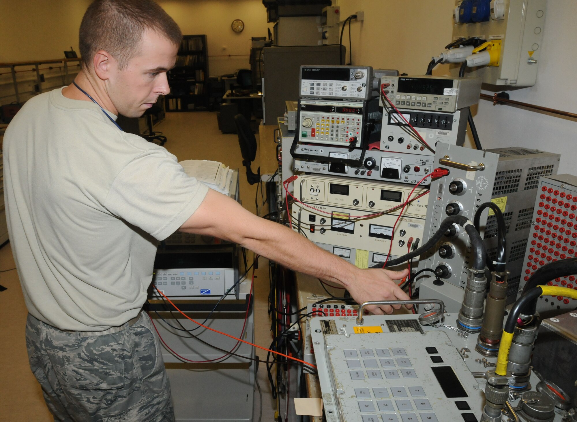 Senior Airman David Blake adjusts the internal resistance of a 501 test set Aug. 16 at Aviano Air Base, Italy. The 501 test set is designed to give pilots operational control over weapons systems and troubleshoot stores management systems. Blake is assigned to the 31st Maintenance squadron precision measurement equipment laboratory as a technical measurement diagnostics equipment technician. (U.S. Air Force photo/Airman LaVel Sterling)