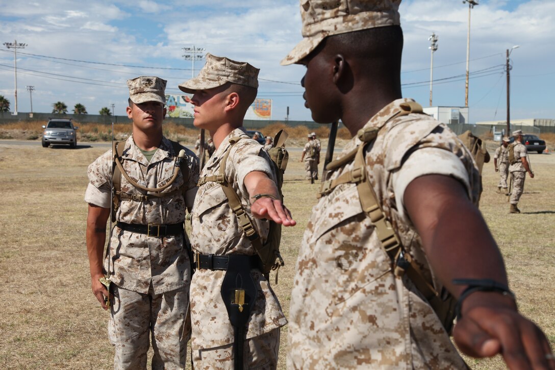Marines with 1st Marine Logistics Group perform the command “dress, right, dress” during the close-order drill portion of the Combat Logistics Regiment 17 Corporals’ Course at Camp Pendleton, Calif., Aug. 17. The corporals attending the course learned basic leadership skills needed to lead the Marines under their charge. They also learned small unit leadership, Marine Corps common skills, sword manual and other Marine Corps knowledge.