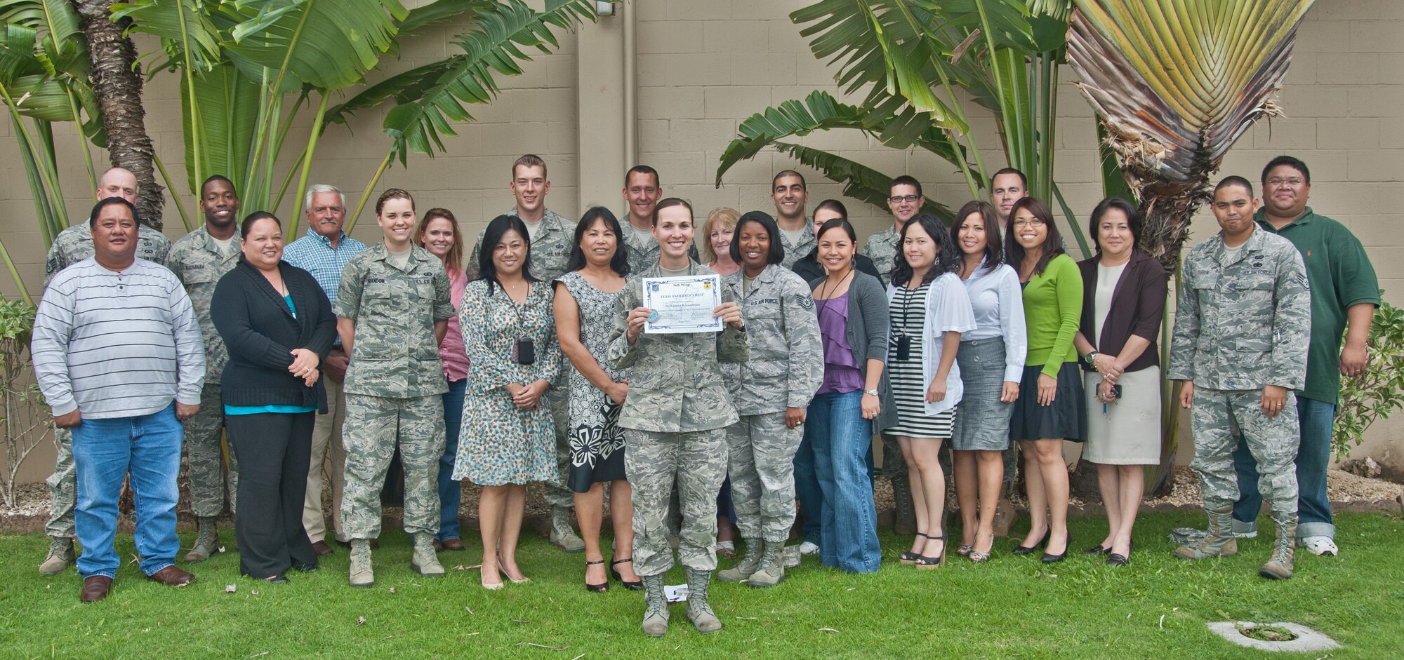 1st Lt. Jessica Greathouse, 36th Contracting Squadron Plans and Programs Flight commander, was awarded Team Andersen's Best here, Aug 18. Andersen's Best is a recognition program which highlights a top performer from the 36th Wing. Each week, supervisors nominate a member of their team for outstanding performance and the wing commander presents the selected Airman/Civilian with an award. (U.S. Air Force photo by Staff Sgt. Alexandre Montes/Released)

