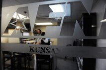 KUNSAN AIR BASE, Republic of Korea -- American Forces Network Kunsan provides information through radio spot production, advertising and informing Wolf Pack members about: safety trends, MWR events and local base policies and procedures. They also produce weekly news stories and features highlighting Kunsan Air Base happenings, initiatives and people and they also provide 40 live local hours of radio every week day from 6 to 10 a.m., featuring critical command information and weather updates. (U.S. Air Force photo/Senior Airman Brittany Y. Bateman)