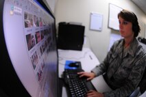 KUNSAN AIR BASE, Republic of Korea -- Airman 1st Class Victoria Secrist, American Forces Network Korea broadcast producer, uses non-linear editing software to edit a news story here Aug. 17. AFN Kunsan produces weekly news stories and features highlighting Kunsan Air Base happenings, initiatives and people. (U.S. Air Force photo/Senior Airman Brittany Y. Bateman)