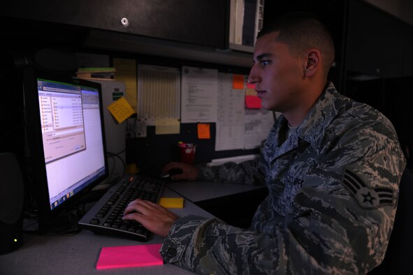 KUNSAN AIR BASE, Republic of Korea -- Senior Airman Reynaldo Gutierrez, 8th Logistics Readiness Squadron maintenance supply liaison, looks over the daily mission capability board here Aug. 18. By doing so he is verifying all statuses are correct and all parts are coming in as soon as possible. (U.S. Air Force photo/Senior Airman Brittany Y. Bateman)