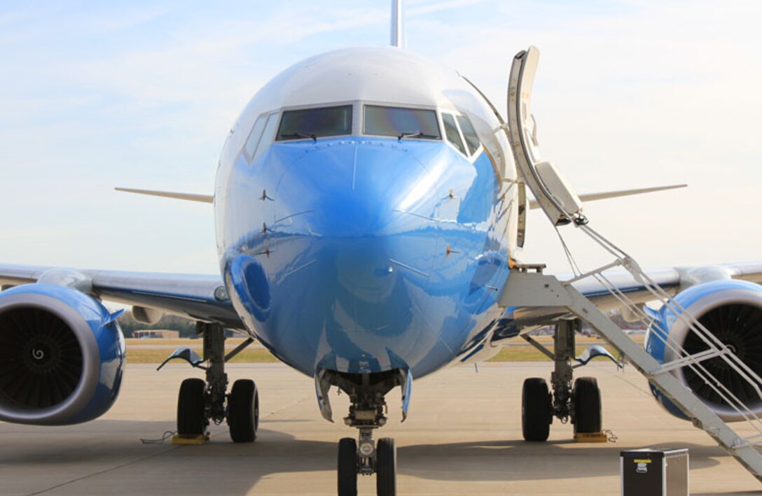 A C-40C is chocked and checked in between missions as it gets ready to go do the nation's business again.  The 932nd Airlift Wing maintains three of the aircraft to travel worldwide as requested transporting high level distinguished visitor missions.  The Air Force Reserve wing is stationed at Scott Air Force Base near Belleville, Ill. (U.S. Air Force photo/Maj. Stan Paregien)