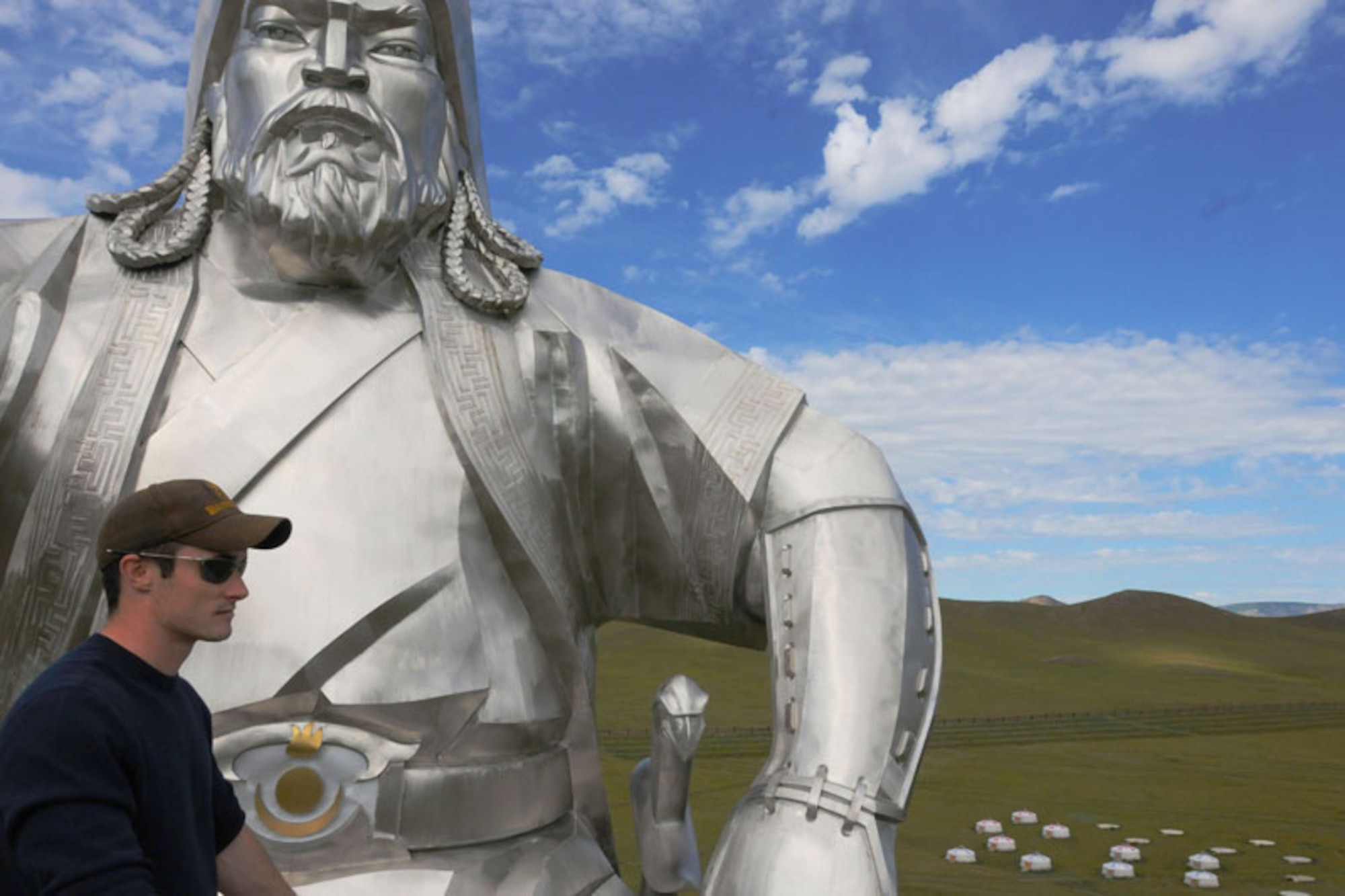Alaska Army National Guard Staff Sgt. James Tollefson, C Company, 1-297th Reconnaissance and Surveillance team leader, , looks out at the rolling hills and scattered yurt villages from the top of the Chinggis Khaan statue while participating in a Morale, Welfare and Recreation Day in and around Ulaanbaatar, Mongolia, Aug. 7. (U.S. Army photo/Sgt. Edward Eagerton)
