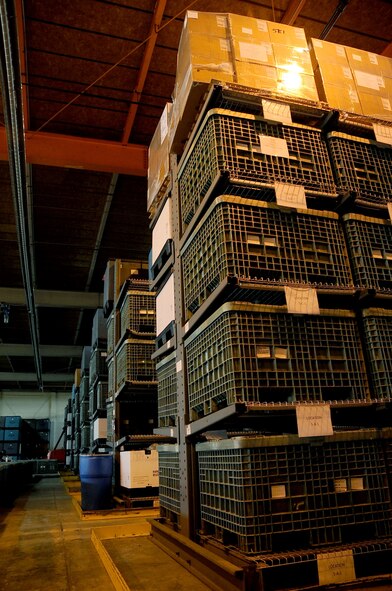 There are more than a hundred crates holding individual protective equipment such as gas masks, chemical suits and cold weather gear at the 2nd Logistics Readiness Squadron mobility and weapons section warehouse on Barksdale Air Force Base, La., for Airmen in-processing the base and deploying overseas. All IPE that is received or returned to the 2 LRS warehouse is updated in a large spreadsheet for proper inventory. (U.S. Air Force photo/Senior Airman Amber Ashcraft) (RELEASED)