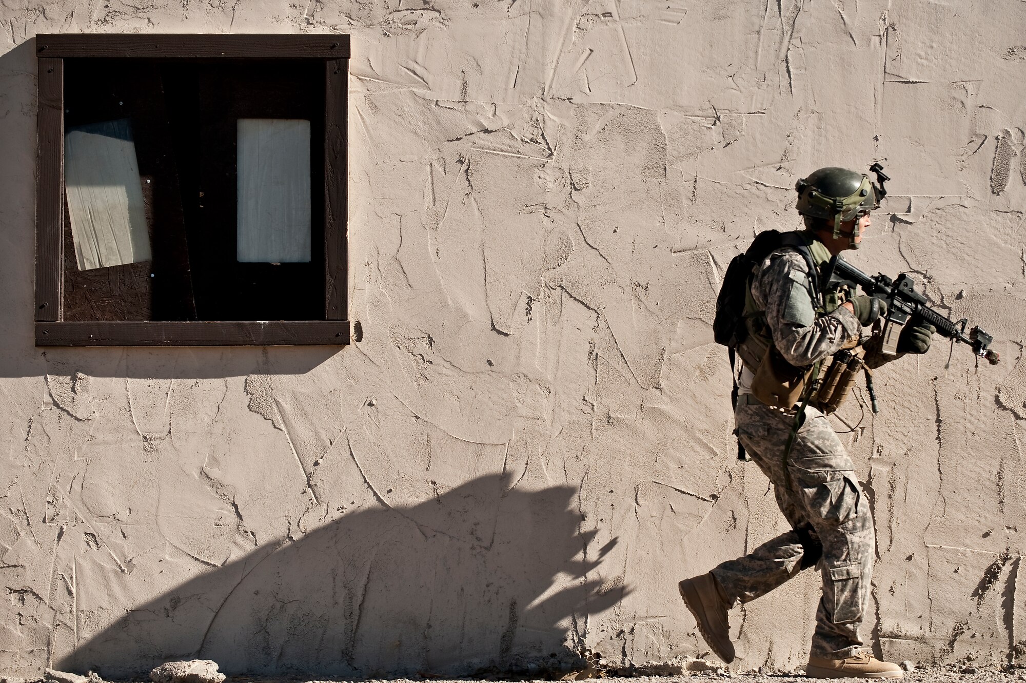 U.S. Air Force Airman 1st Class Michael Pincheira, 5th Air Support Operations Squadron tactical air control part, from Fort  Lewis, Wash., provides security during a Green Flag-West 11-9 training exercise Aug. 14, 2011, in the National Training Center at Fort Irwin, Calif.  JTAC Airmen train with the 12th Combat Training Squadron as part of Green Flag-West to prepare for upcoming deployments. (U.S. Air Force photo by Tech. Sgt. Michael R. Holzworth/Released)
