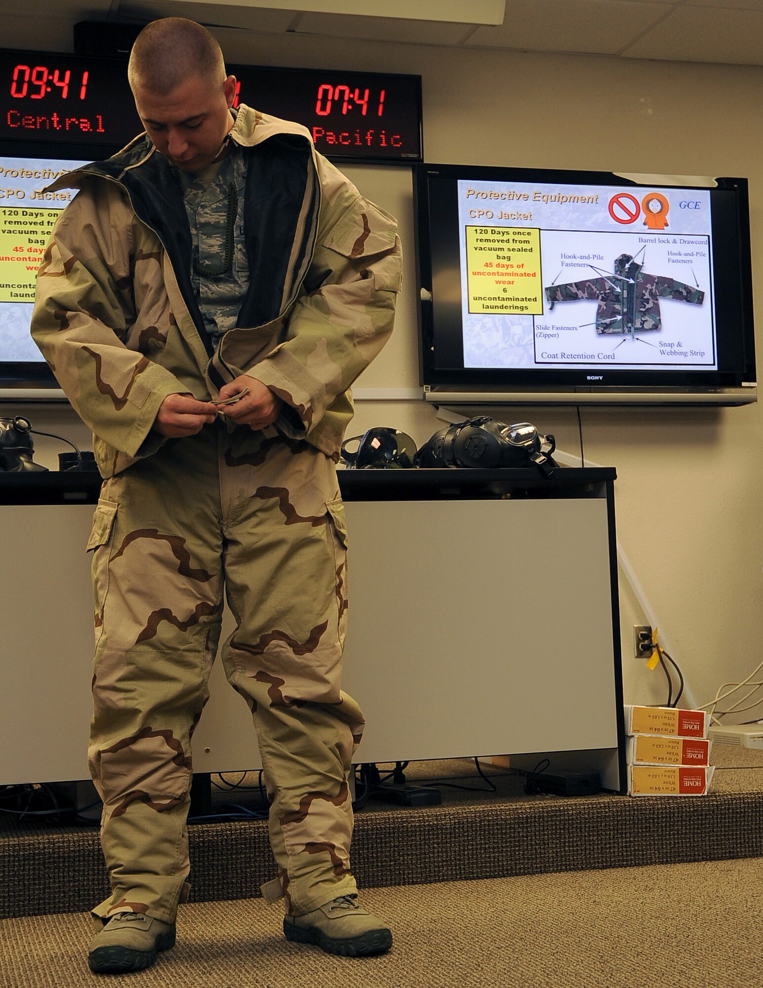 Staff Sgt. Jason Hill, 2nd Maintenance Squadron, demonstrates Mission Oriented Protective Posture level one during a chemical, biological, radiological, nuclear and high-yield explosive class on Barksdale Air Force Base, La., Aug. 18. The 2nd Civil Engineer Squadron Emergency Management flight teaches the CBRNE class several times a month to keep Barksdale Airmen up to date with their training requirements. (U.S. Air Force photo/Senior Airman Amber Ashcraft) (RELEASED)