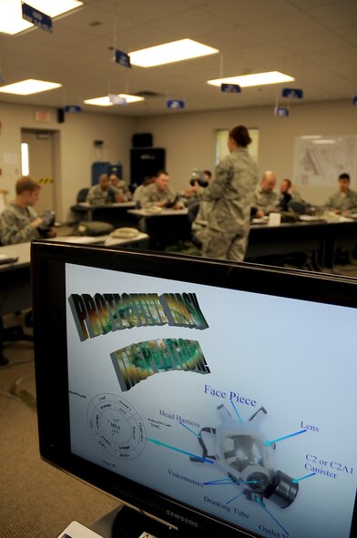 Senior Airman Nika Kliebert, 2nd Civil Engineer Squadron Emergency Management flight, speaks to more than 20 Airmen attending the chemical, biological, radiological, nuclear and high-yield explosive class on Barksdale Air Force Base, La., Aug. 18. The EM flight teaches the CBRNE class several times a month to keep Barksdale Airmen up to date with training requirements. (U.S. Air Force photo/Senior Airman Amber Ashcraft) (RELEASED)