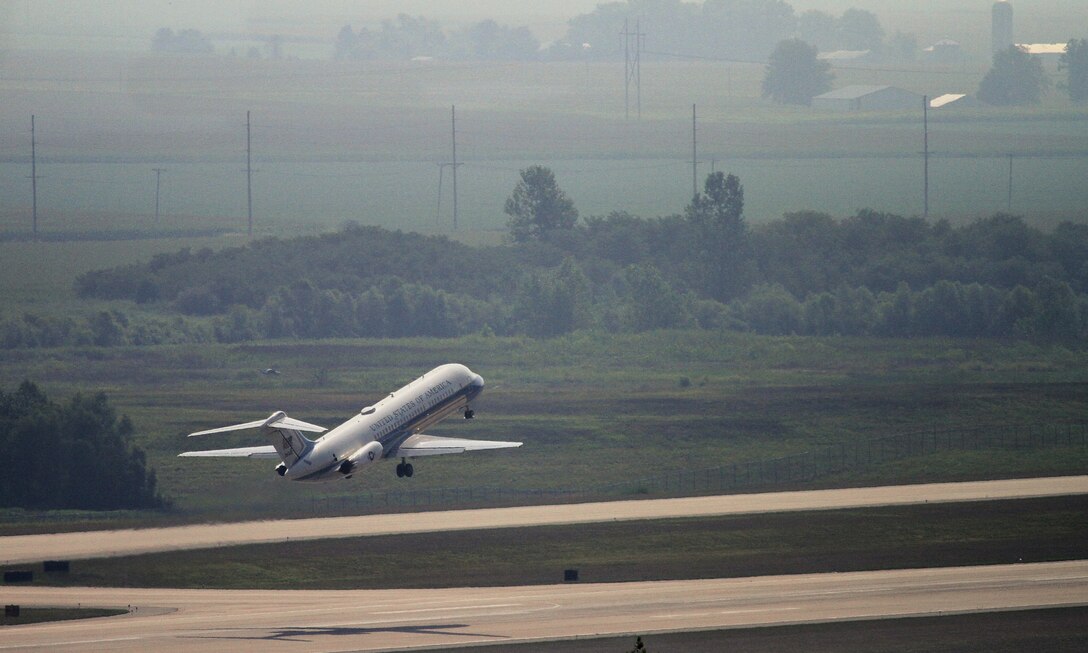 One of the few remaining C-9C planes of the 932nd Airlift Wing departs Scott Air Force Base for the last time.  Its new home will be at the Air Mobility Command Museum, Dover Air Force Base in Delaware.  The Air Force Reserve Command flying wing will continue to fly three C-40C planes.  (U.S. Air Force photo/Tech. Sgt. Christopher Parr)