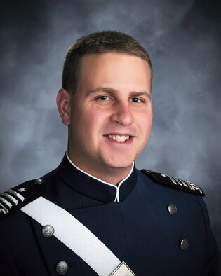 Second Lt. Michael Trubilla, seen here in his senior photo from the Air Force Academy, was named the Air Force Science and Technology Cadet Research Award winner for his work, which could vastly increase the efficiency of plutonium-based power sources for satellites. (U.S. Air Force photo)