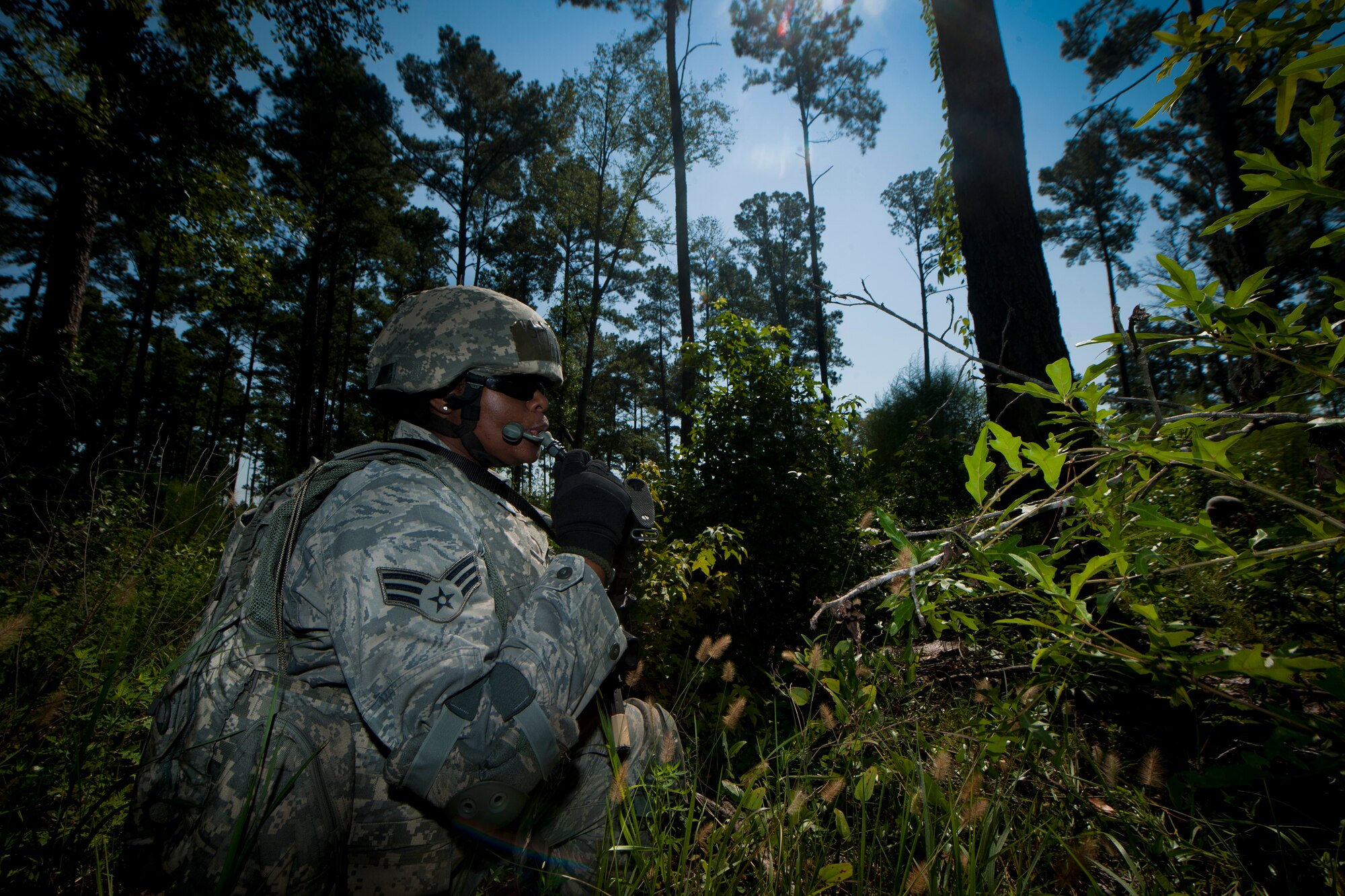 U.S. Air Force Alexandria Brye, 23rd Security Forces Squadron fireteam member, takes a sip of water while her unit holds its position during a phase II operational readiness exercise at Moody Air Force Base, Ga., Aug. 17, 2011. (U.S. Air Force photo by Airman 1st Class Joshua Green/Released)
