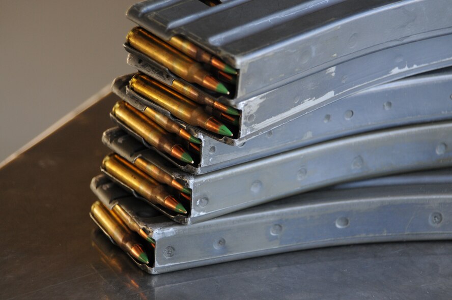 Loaded magazines sit ready during weapons qualification training with the M-4 rifle at Vandenberg Air Force Base, Cali. The 126th Civil Engineering Squadron, Illinois Air National Guard, from Scott Air Force Base, Ill., is in California doing two weeks of annual training at Camp Roberts. The Army National Guard training base was created in 1941 to support troops leaving for World War II and is now in need of repairs to buildings and infrastructure. Air National Guard Civil Engineering squadrons, known as "Prime Beef" units when deployed, are using the opportunity to train on real world electrical, structural, plumbing and heavy equipment scenarios. This creates a  collaboration that proves valuable to both National Guard components.