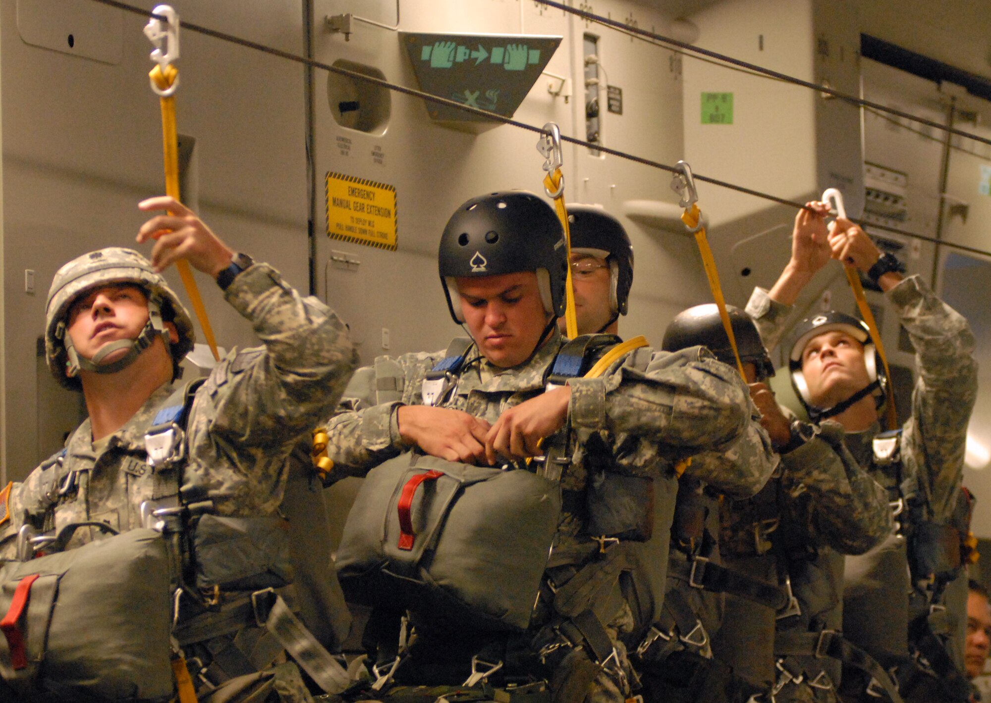 Soldiers from the Special Operations Command, Pacific, prepare for static jumps out of a 535th Airlift Squadron C-17 from Joint Base Pearl Harbor-Hickam, Hawaii, Aug. 11. SOCPAC is headquartered at Camp Smith, Hawaii. (U.S. Air Force photo/Staff Sgt. Carolyn Herrick)